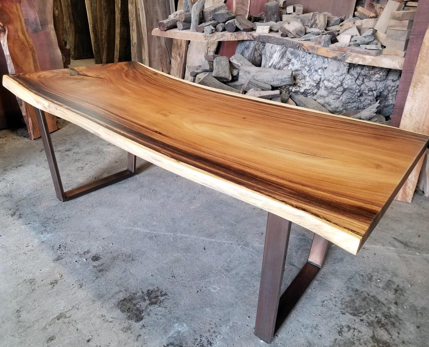 Monkey Pod wood table on metal table legs