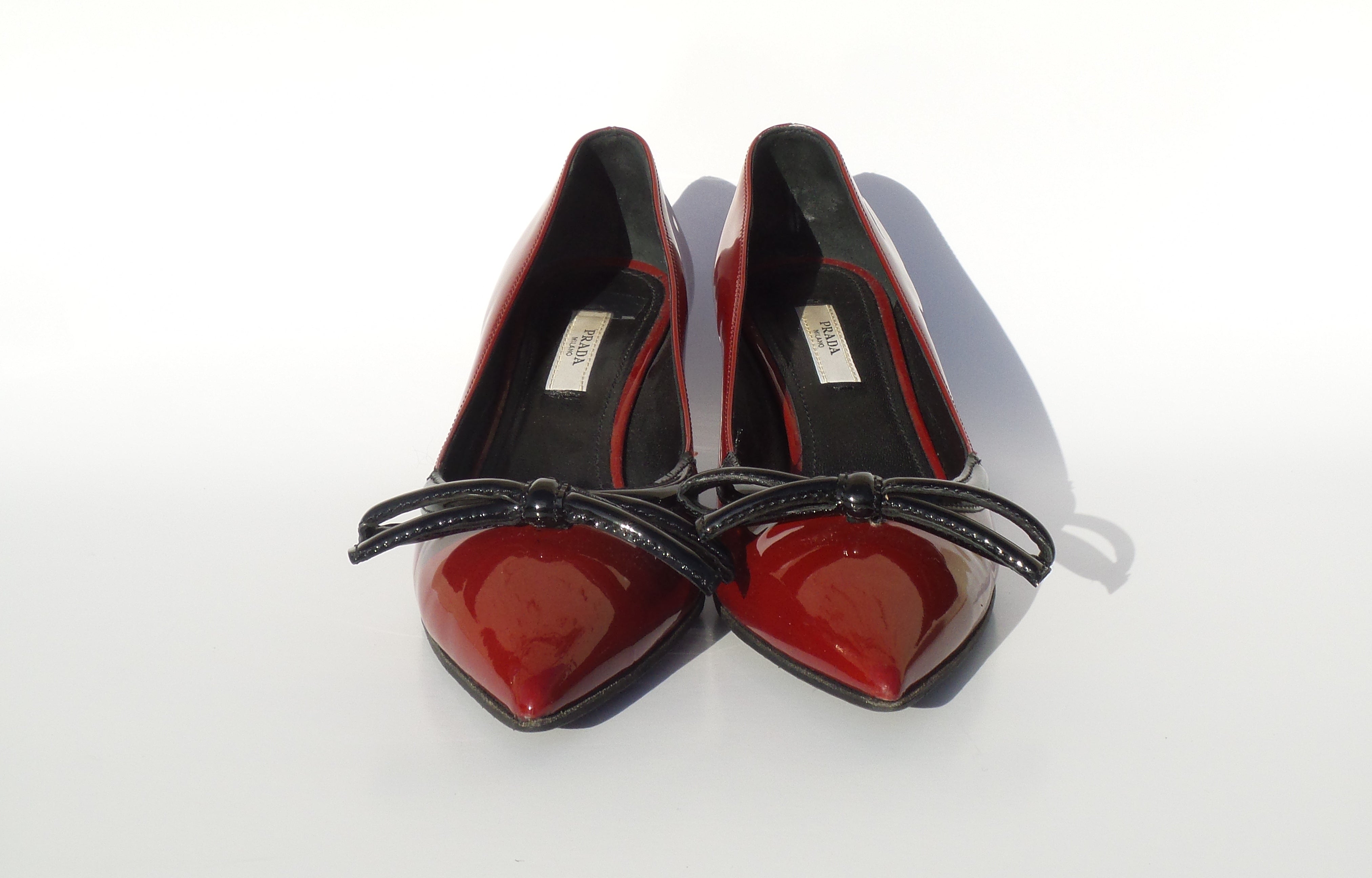 red and black kitten heel shoes