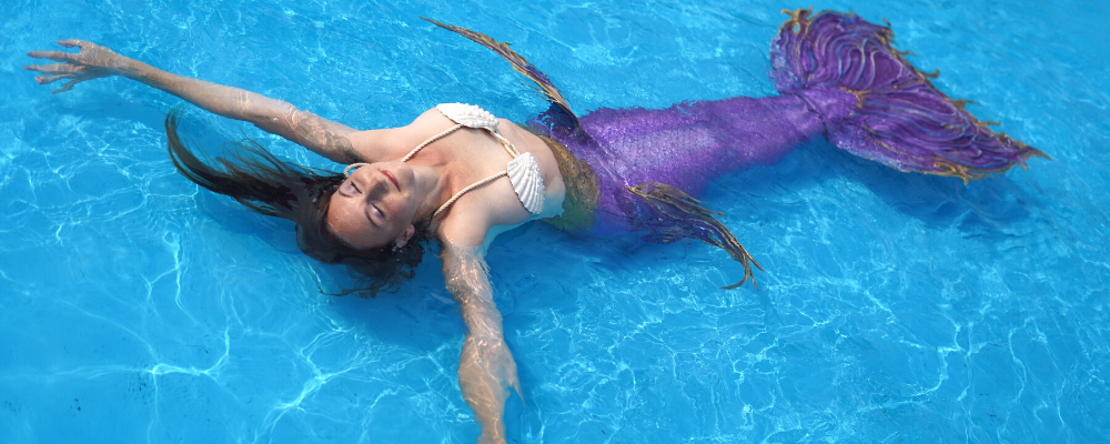 Purple mermaid tail starfish floating pool marielle montreal