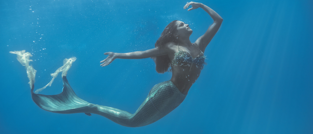 breath holding mermaid free diving
