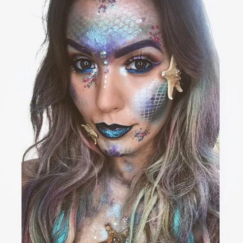 Woman in glamorous mermaid makeup