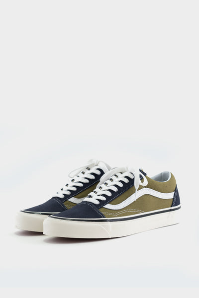 olive green and white vans