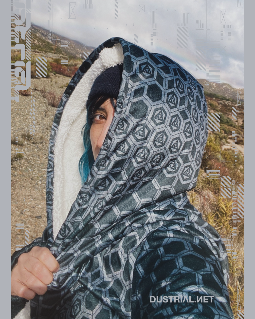 iko wearing a dustrial deepfleece cloak in the Mojave desert