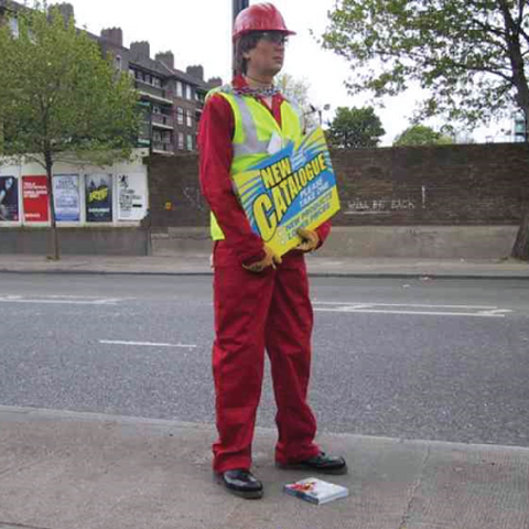 manequinn holding a sign on UK street