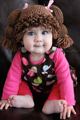 Crochet Cabbage Patch Kid Hat designed by Amanda Lillie of The Lillie Pad became a worldwide viral sensation in 2013