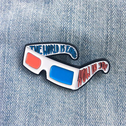 "The World is Ending... Now in 3D!" Movie enamel pin. 