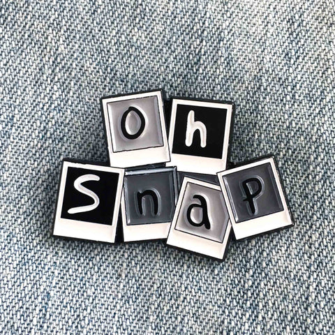 "Oh Snap" photography themed enamel pin. 