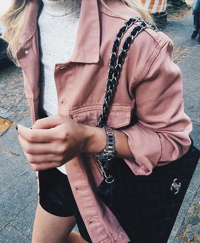 Cute, pink jean jacket for women.