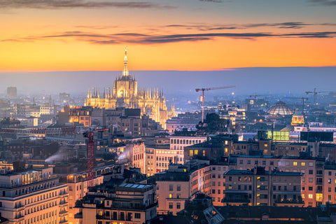 Milan, Italy cityscape with the Duomo at dusk 