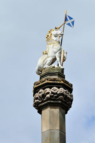 Unicorn with a saltire on top of Edinburgh's Mercat Cross 