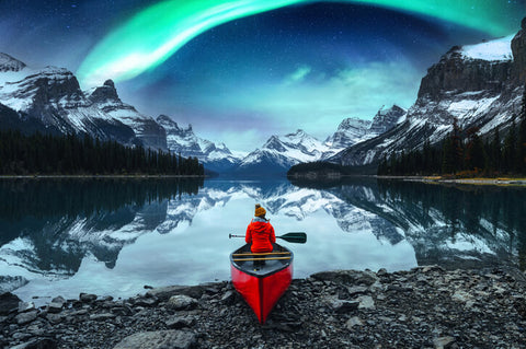 aurora borealis over Spirit Island in Maligne lake at Jasper national park, Alberta, Canada