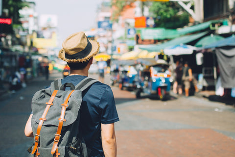 Backpacker at market