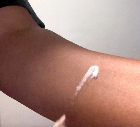 Whipped body butter on forearm