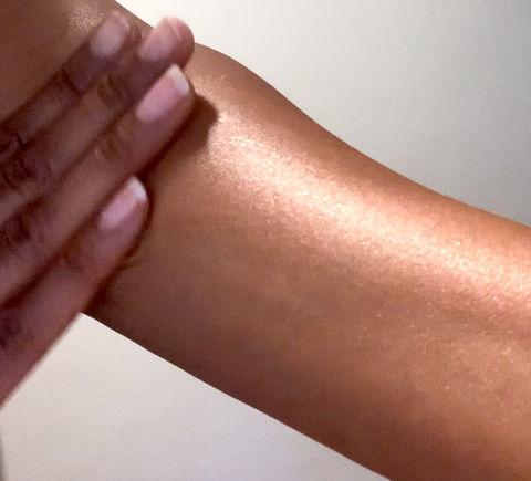 Body butter rubbed into forearm