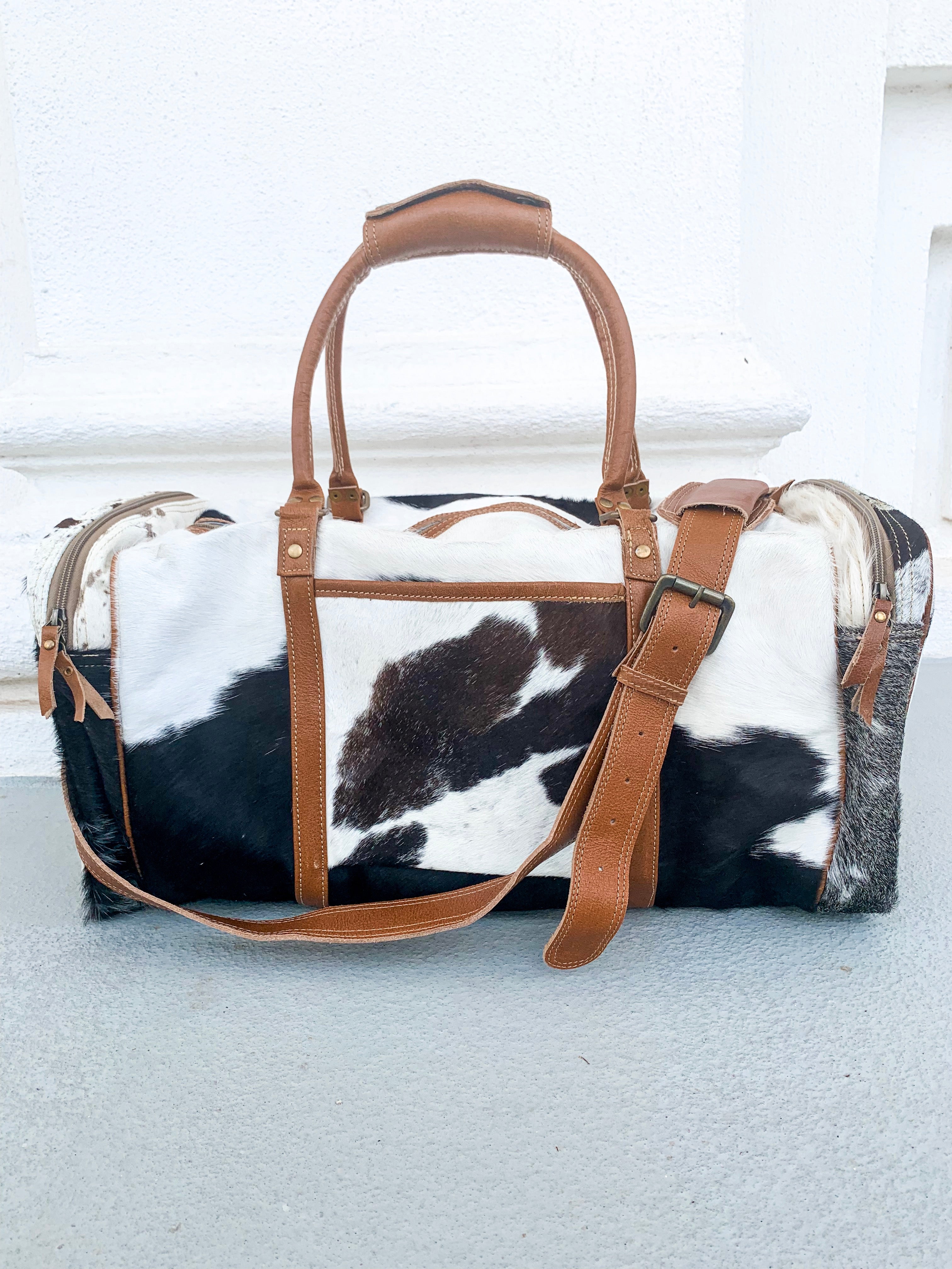 myra cowhide duffle bag