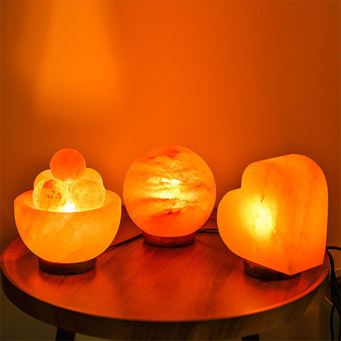 Multiple Himalayan Salt Lamps of different shapes and sizes