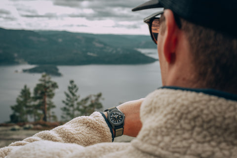 man wearing watch outdoors