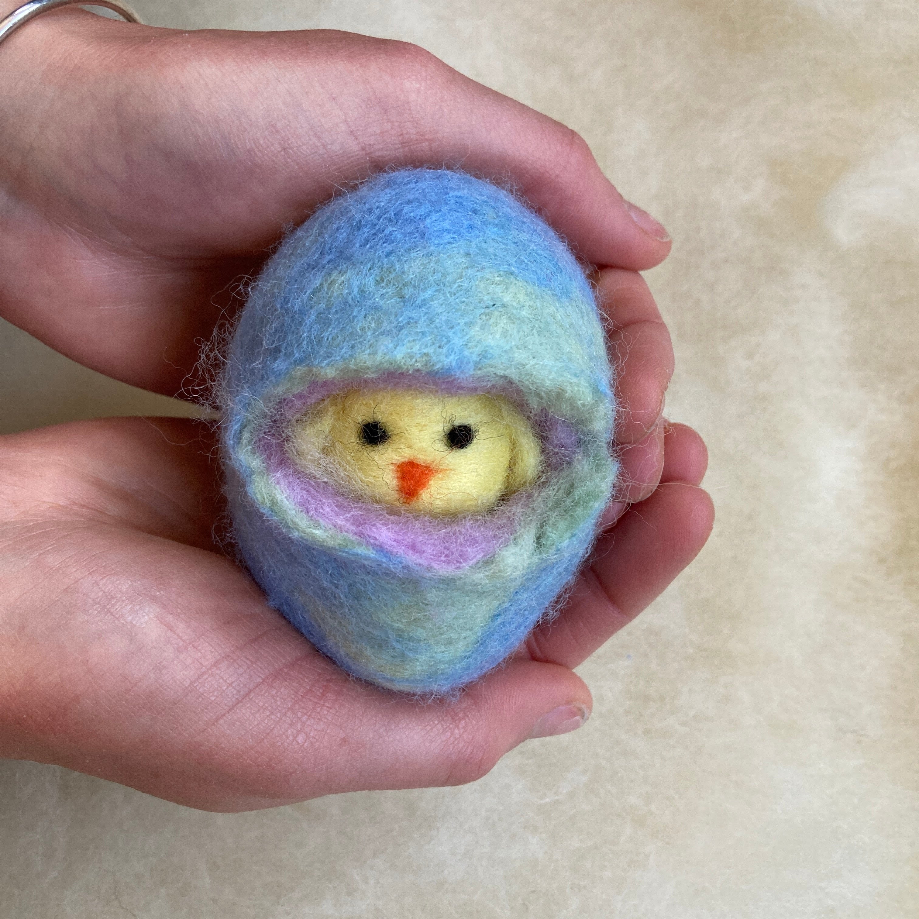 Adding the chick to the wool egg | Bella Luna Toys