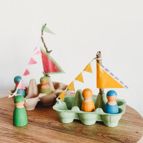 A DIY recylable toy boat made from egg cartons.