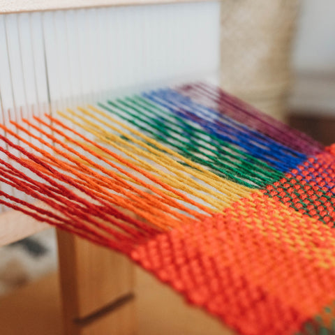 Easy weaver loom threaded with rainbow yarn at Bella Luna Toys
