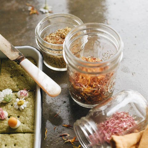 Jar of flower petals for Green Tea and Flower Shortbread Cookies by KC Hysmith