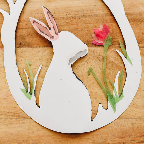Glue smaller details onto your Easter Waldorf Window Transparency printable for Bella Luna Toys