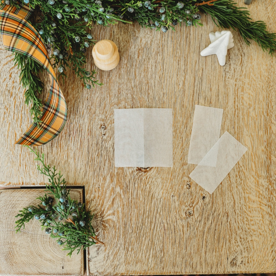 Kite paper being folded on a table.