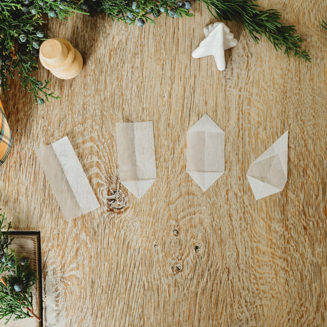 Different stages of the folded snowflake.