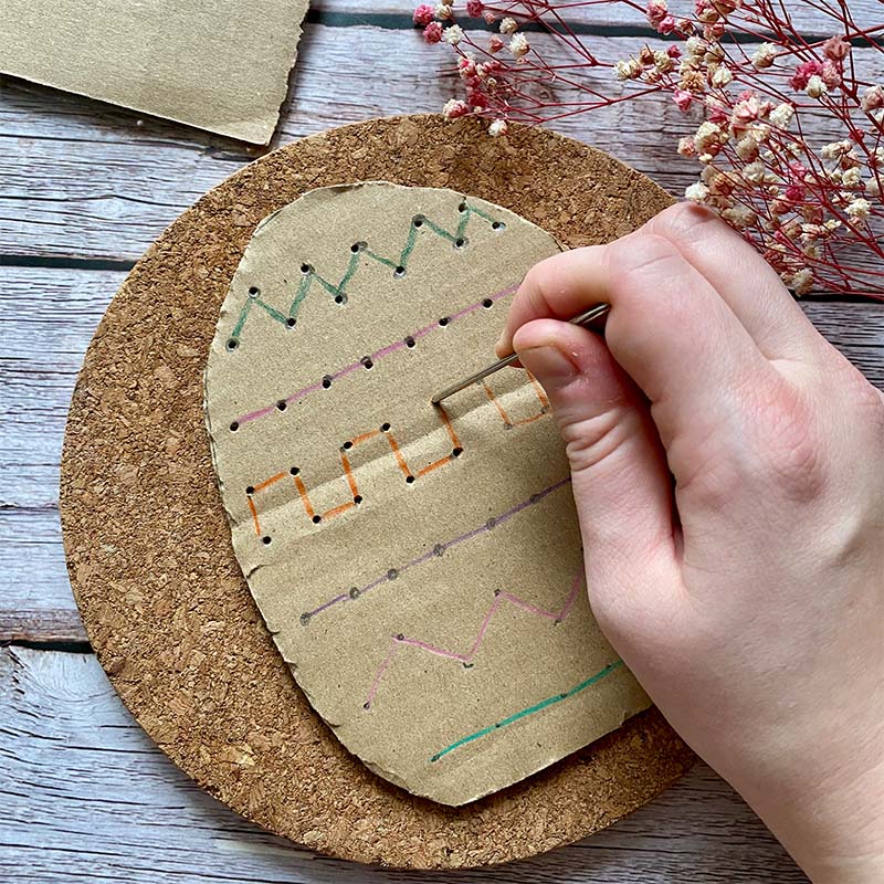 DIY Cardboard embroidered egg craft.