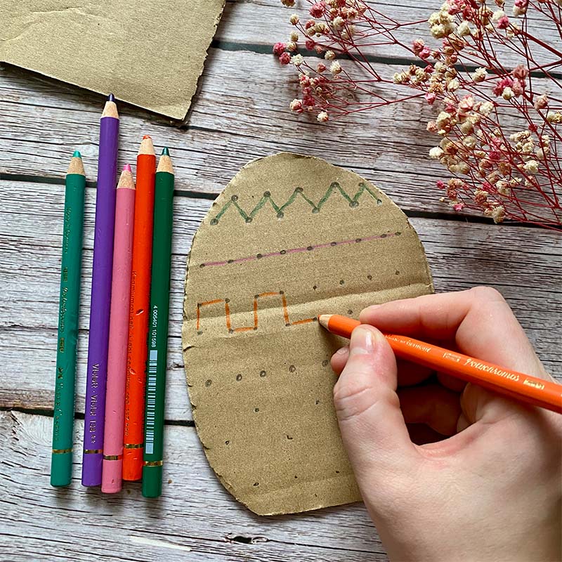 DIY Cardboard embroidered egg craft.