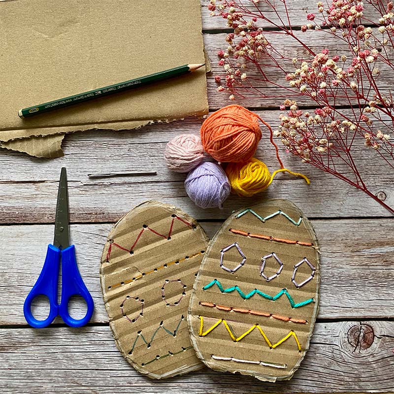 DIY Cardboard embroidered egg craft.