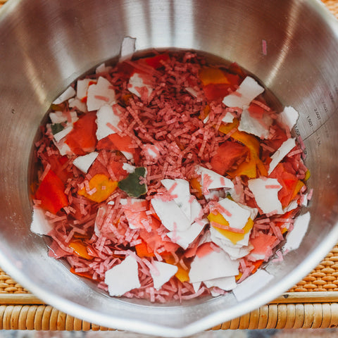 Shredded paper soaking to make paper pulp. DIY paper tutorial papermaking