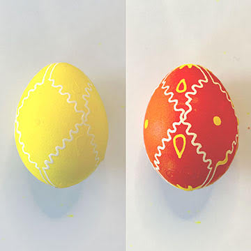 Two eggs, one is yellow and one is orange with yellow and white detail | Bella Luna Toys