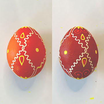 Two Pysanky eggs, one orange and one red with yellow and orange details | Bella Luna Toys
