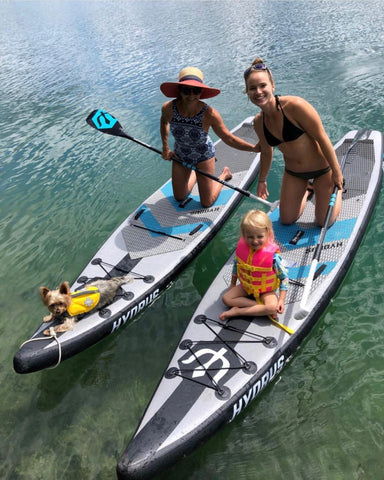 people having fun on paddleboard