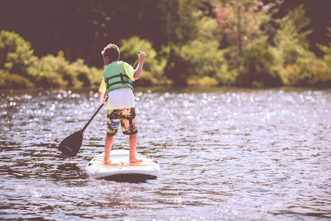 kid on inflatable paddlboard