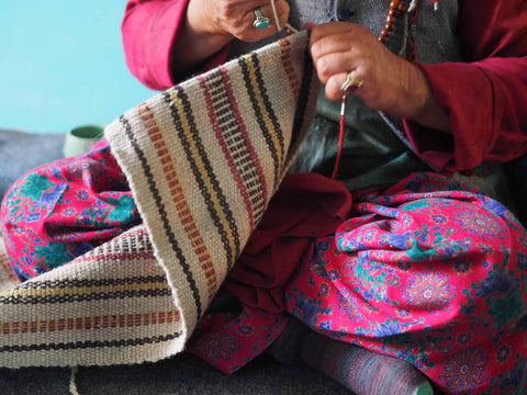 typical ladakhi flatweave wool carpet made from sheep wool and naturally dyed sheep wool 