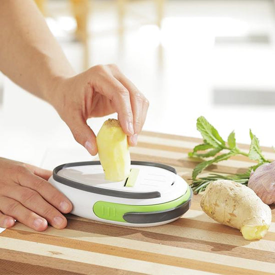 https://cdn.shopify.com/s/files/1/1115/2632/products/kitchen-4-in-1-ginger-peeler-grater-slicer-extractor-tool-1_550x.jpg?v=1534970497