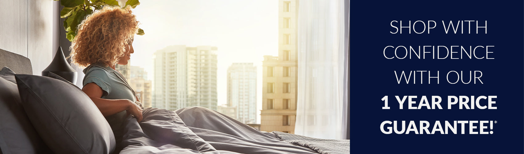 Shop with confidence with our 1 Year Price Guarantee. Woman relaxing on bed overlooking a city view