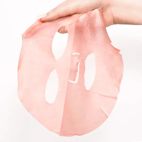 rose sheet mask in hands patchology restoring renewing skincare