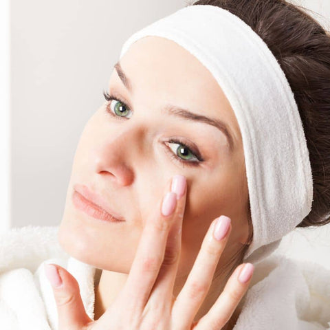 woman applying eye cream anti-aging eye gels