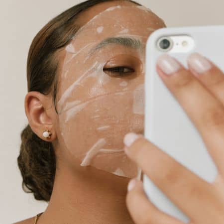 squalane on a sheet mask to hydrate skin