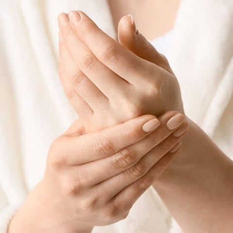 shea butter on hands close up