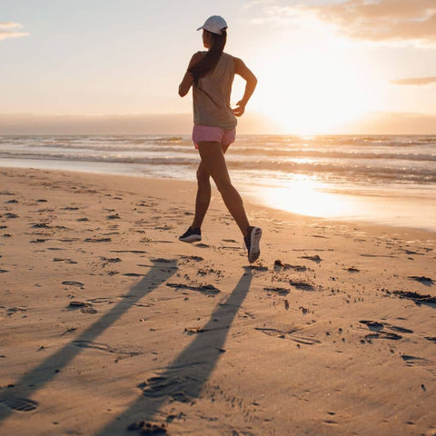 woman exercising sunset