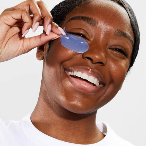 woman wearing on ice eye gels restoring and moisturizing her under eyes