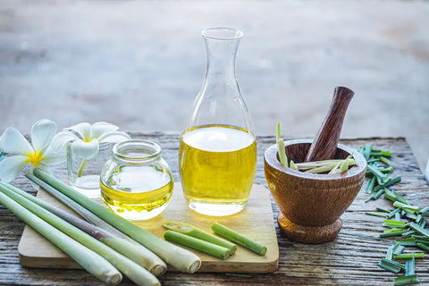Lemongrass essential oil on table