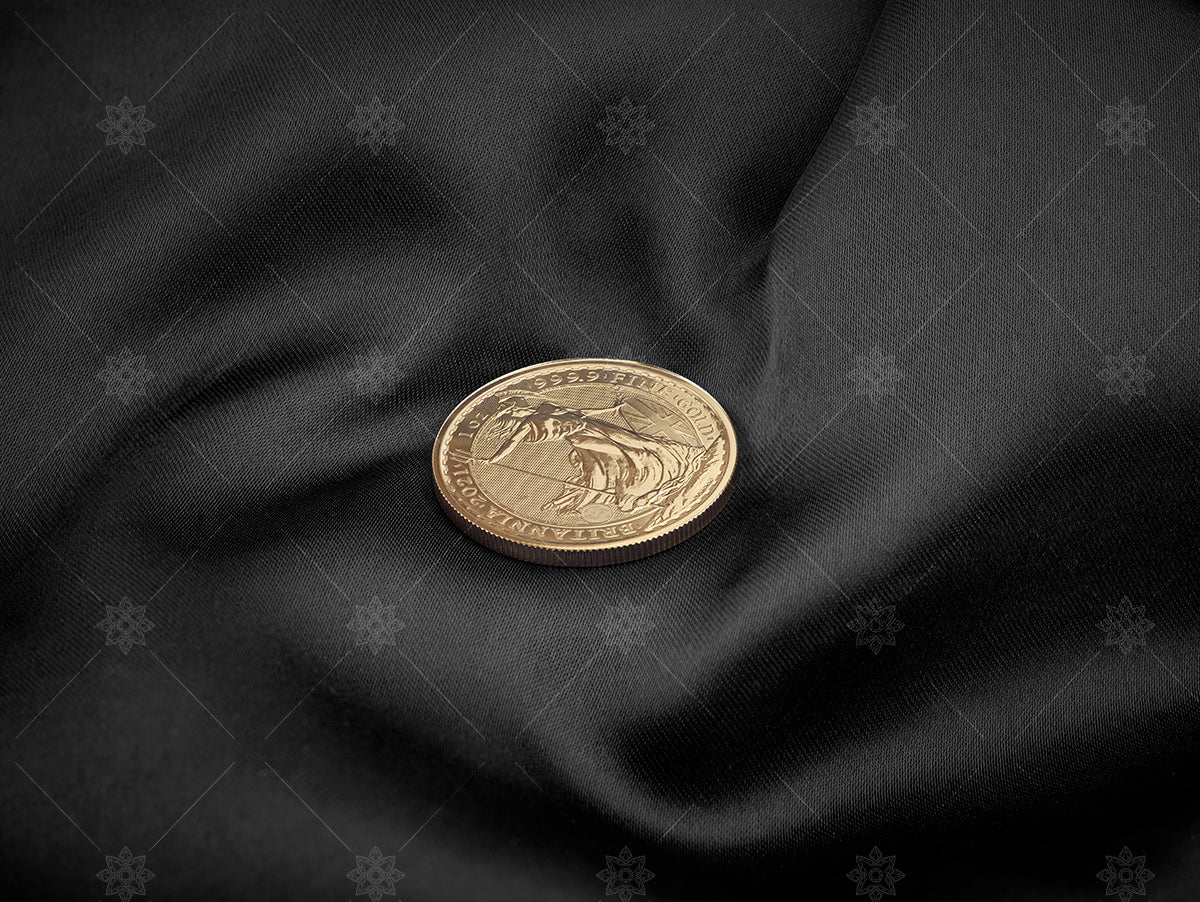 Gold Bullion Coin on black silk