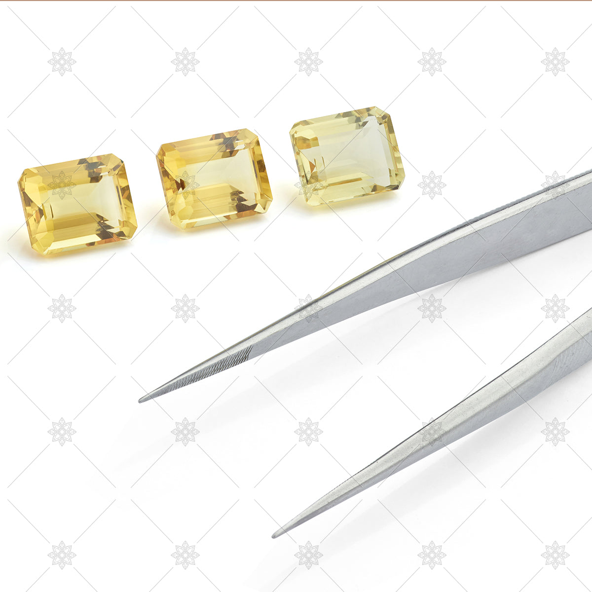 Citrine Gemstones with Tweezers