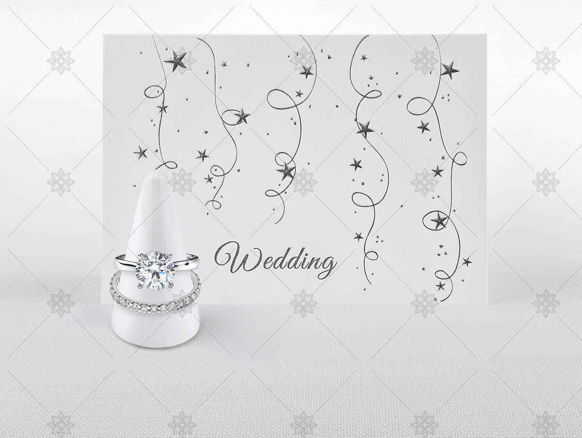 Wedding day card and diamond rings