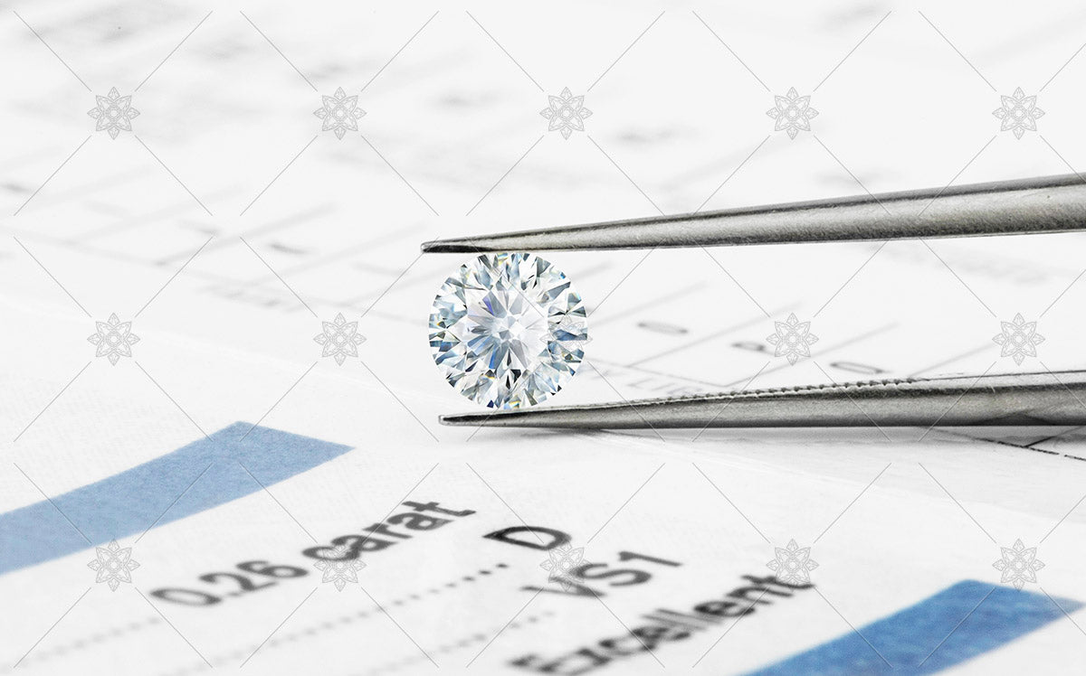 Certified diamond held in tweezers